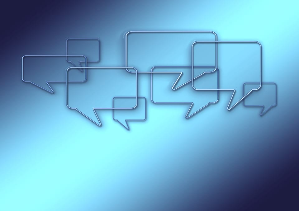 A group of speech bubbles representing communication