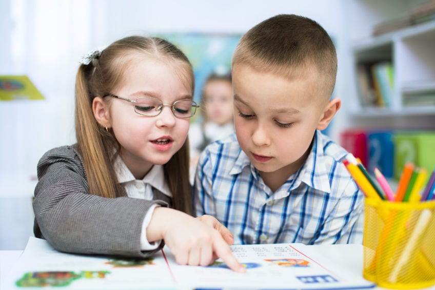 Schoolchildren read together