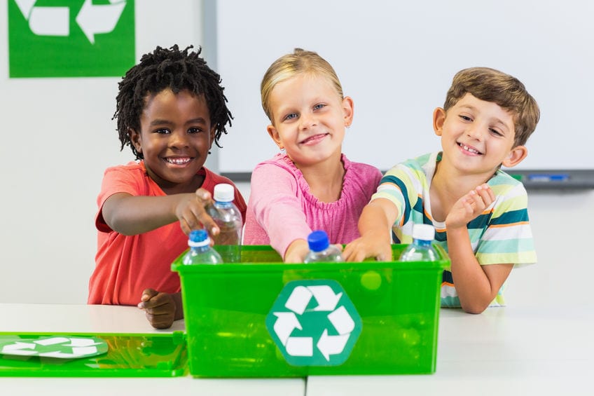 School pupils recycle plastics together
