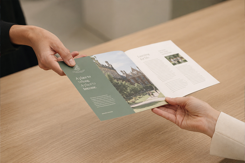 Parents looking at custom printed prospectus